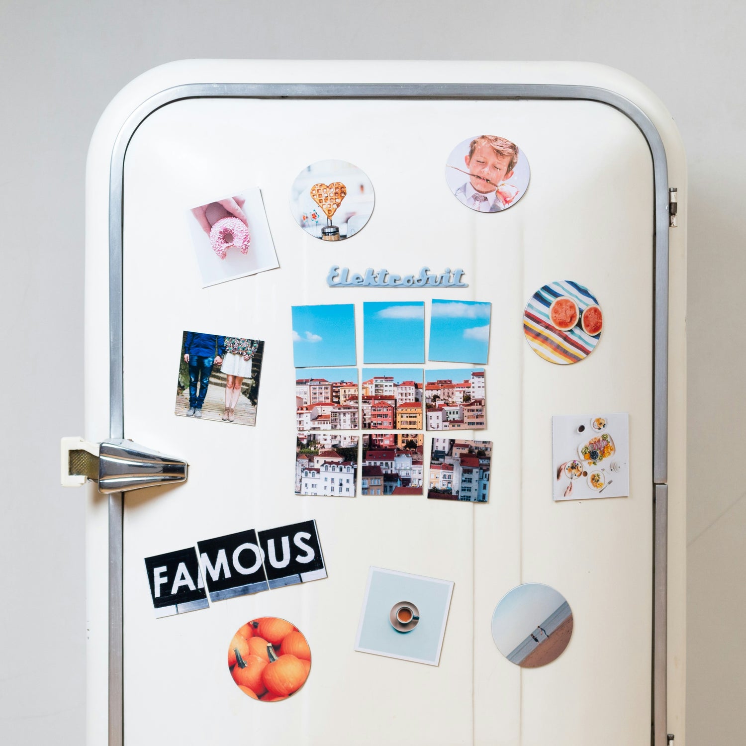 White refrigerator door with various magnets and photos attached. Image was taken from unsplash.com